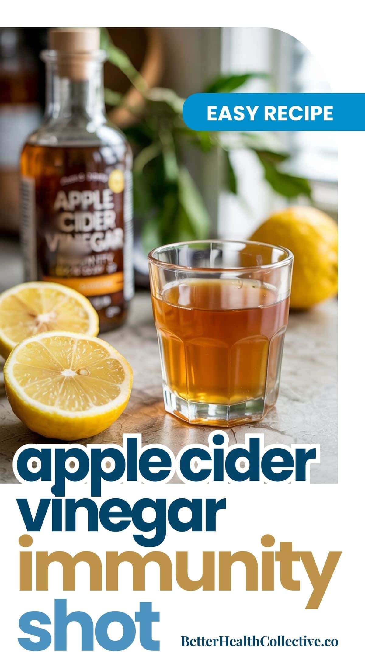 A glass of apple cider vinegar drink sits beside lemon halves, a whole lemon, and a bottle of apple cider vinegar on a table. Text reads: Easy Recipe. Apple cider vinegar immunity shots. BetterHealthCollective.co.
