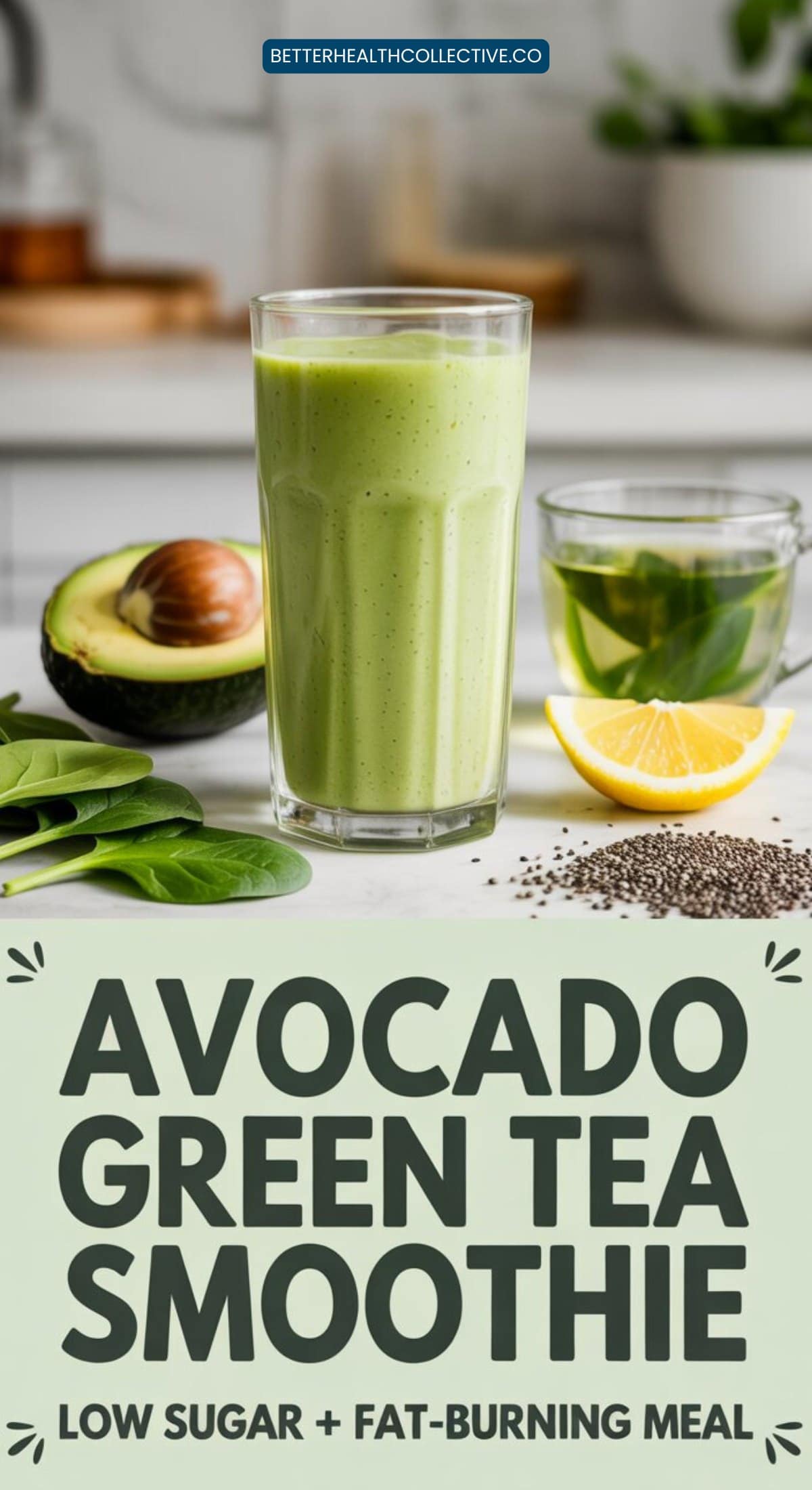 A creamy green smoothie sits on a table with half an avocado, lemon slice, spinach leaves, chia seeds, and a cup of green tea nearby. Text below reads Avocado Green Tea Smoothie: Low Sugar + Fat-Burning Meal—your new favorite filling smoothie.