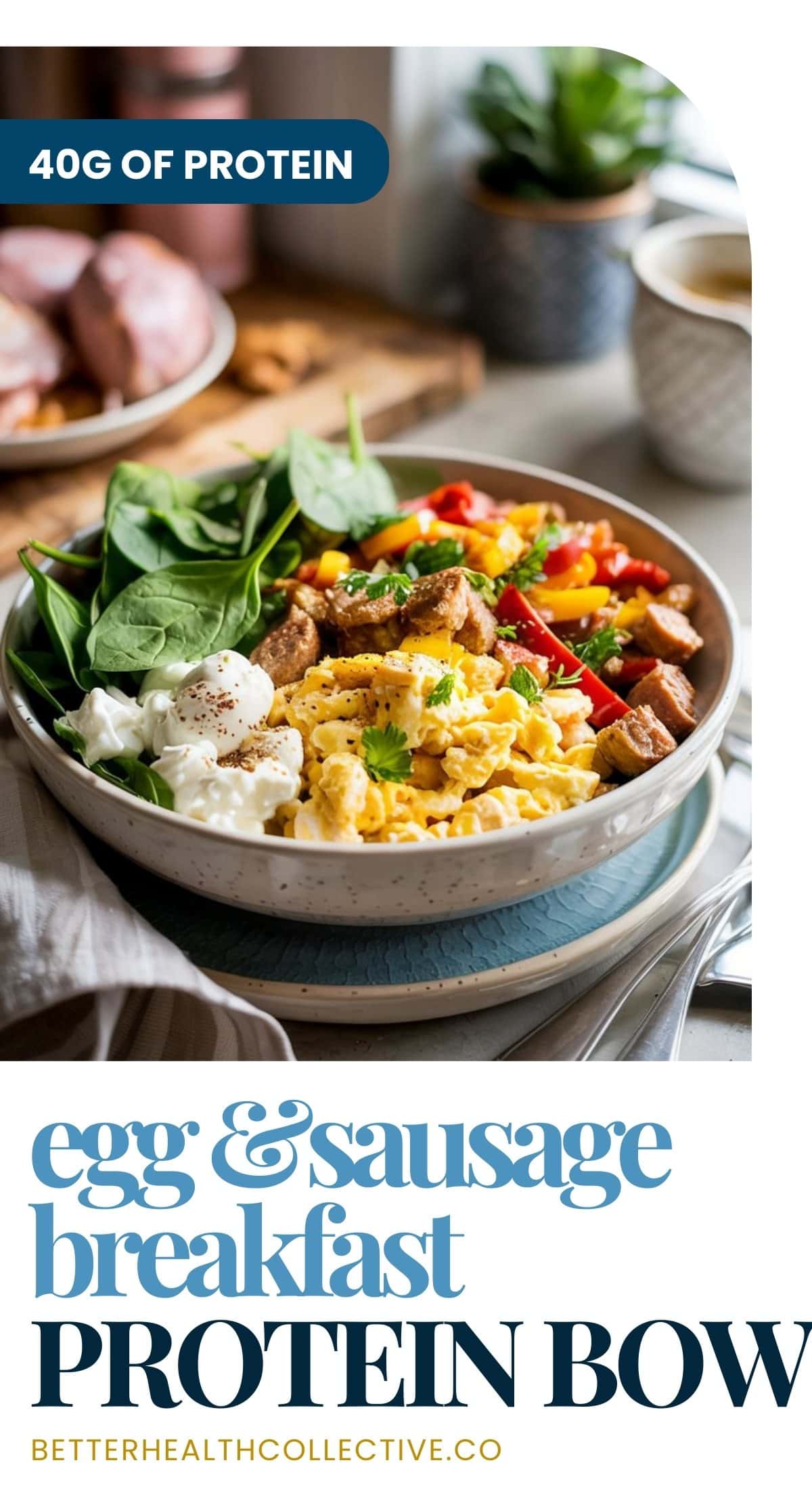 A flavorful Breakfast Protein Bowl featuring scrambled eggs, sausage, spinach, tomatoes, and rice sits on a plate with a fork, garnished with herbs. Text reads “40g of protein” and “Egg & Sausage Breakfast Protein Bowl.”.