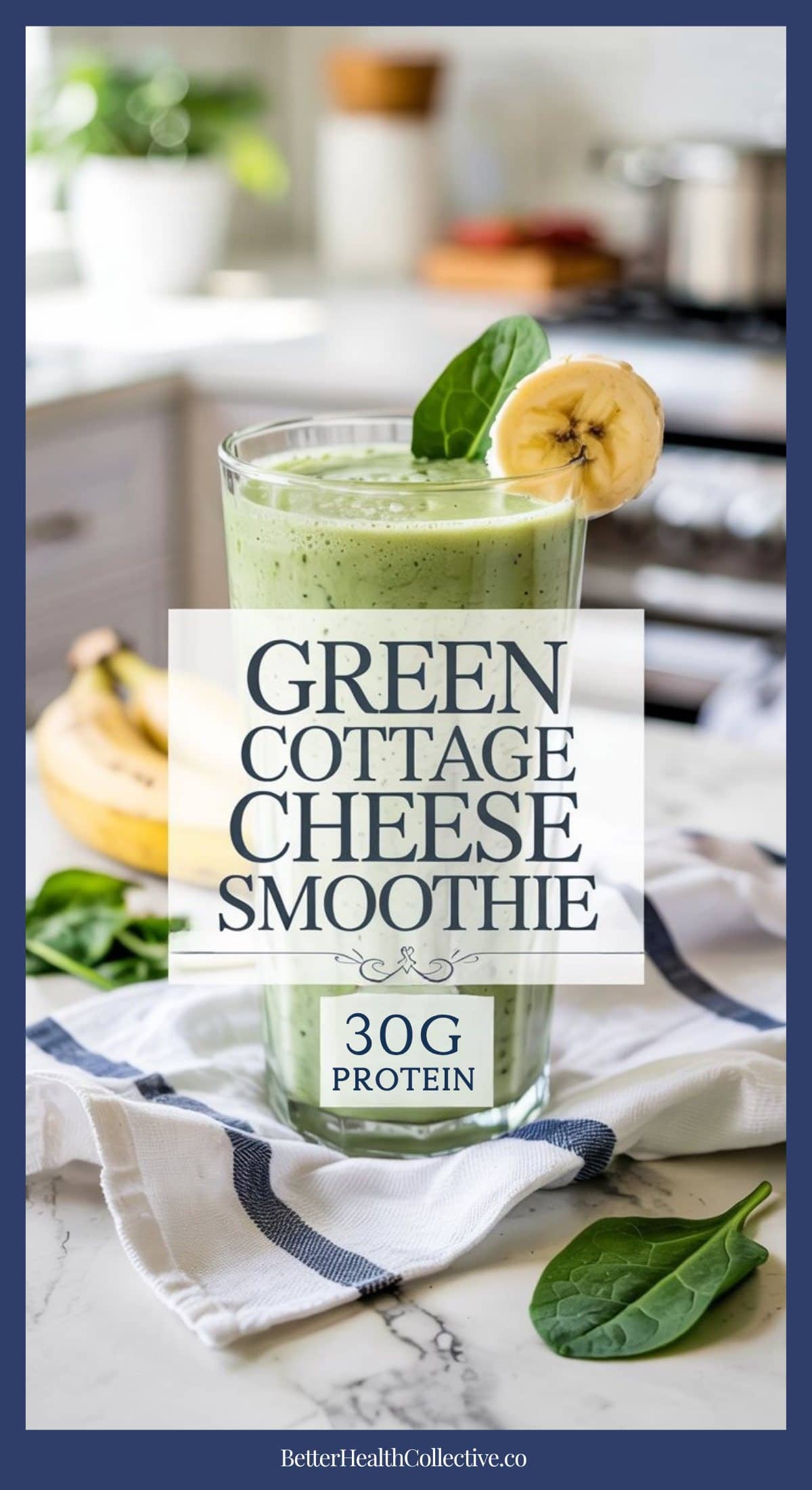 A Green Cottage Cheese Smoothie in a clear glass, topped with spinach leaves and a banana slice, rests on a striped towel in a sunlit kitchen. Text on image: Green Cottage Cheese Smoothie, 30g Protein.