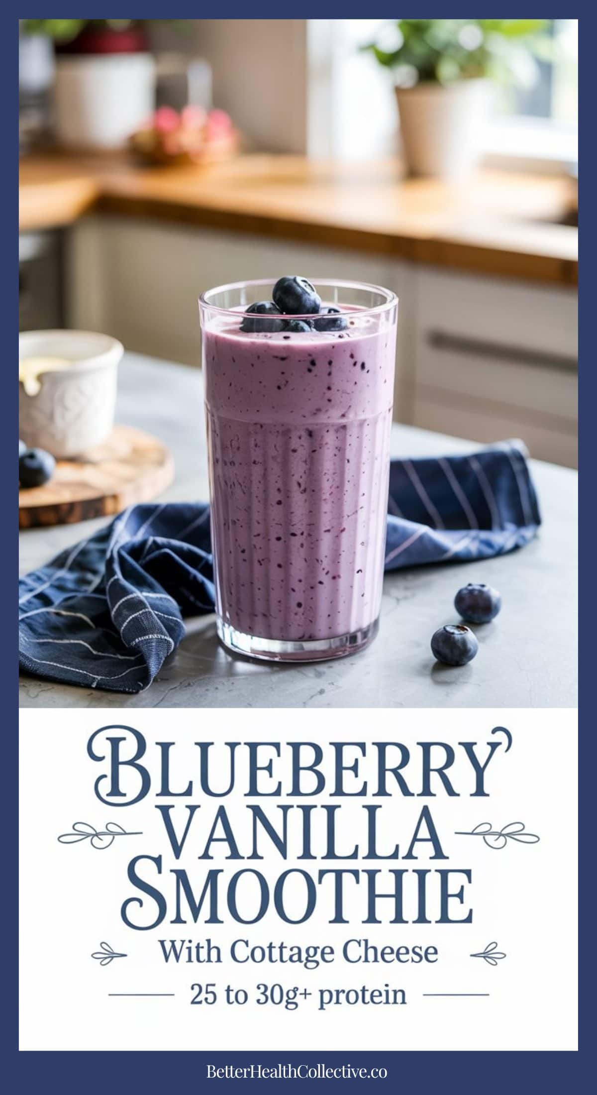 A tall glass of high-protein blueberry cottage cheese smoothie topped with blueberries sits on a kitchen counter beside a blue napkin, with text below reading, Blueberry Vanilla Smoothie with Cottage Cheese, 25 to 30g+ protein.