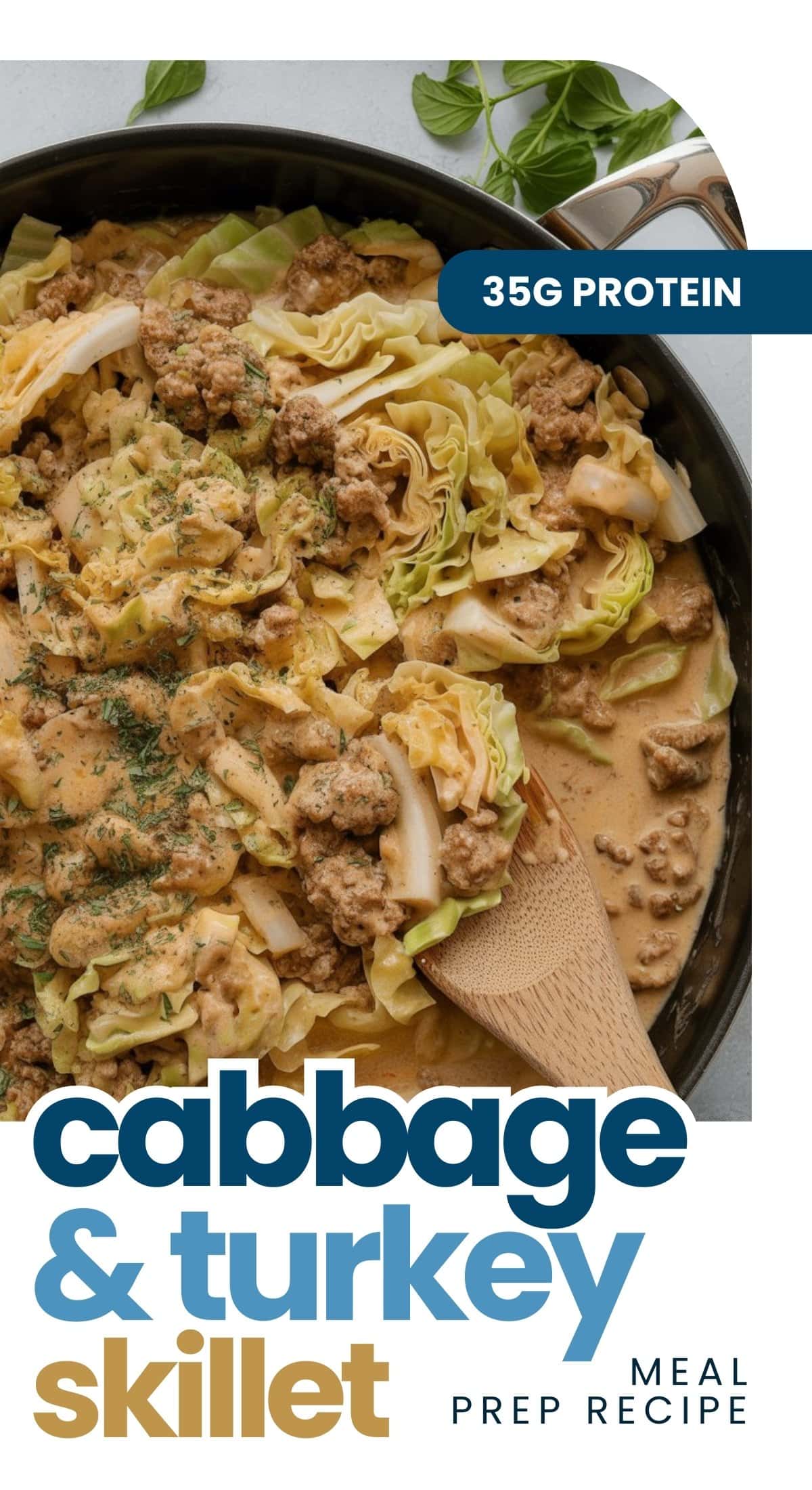 A skillet filled with a cooked mixture of cabbage, ground turkey, and creamy cottage cheese sauce, topped with herbs. A wooden spoon is resting in the cabbage skillet. Text reads: 35g protein, cabbage & turkey skillet, meal prep recipe.