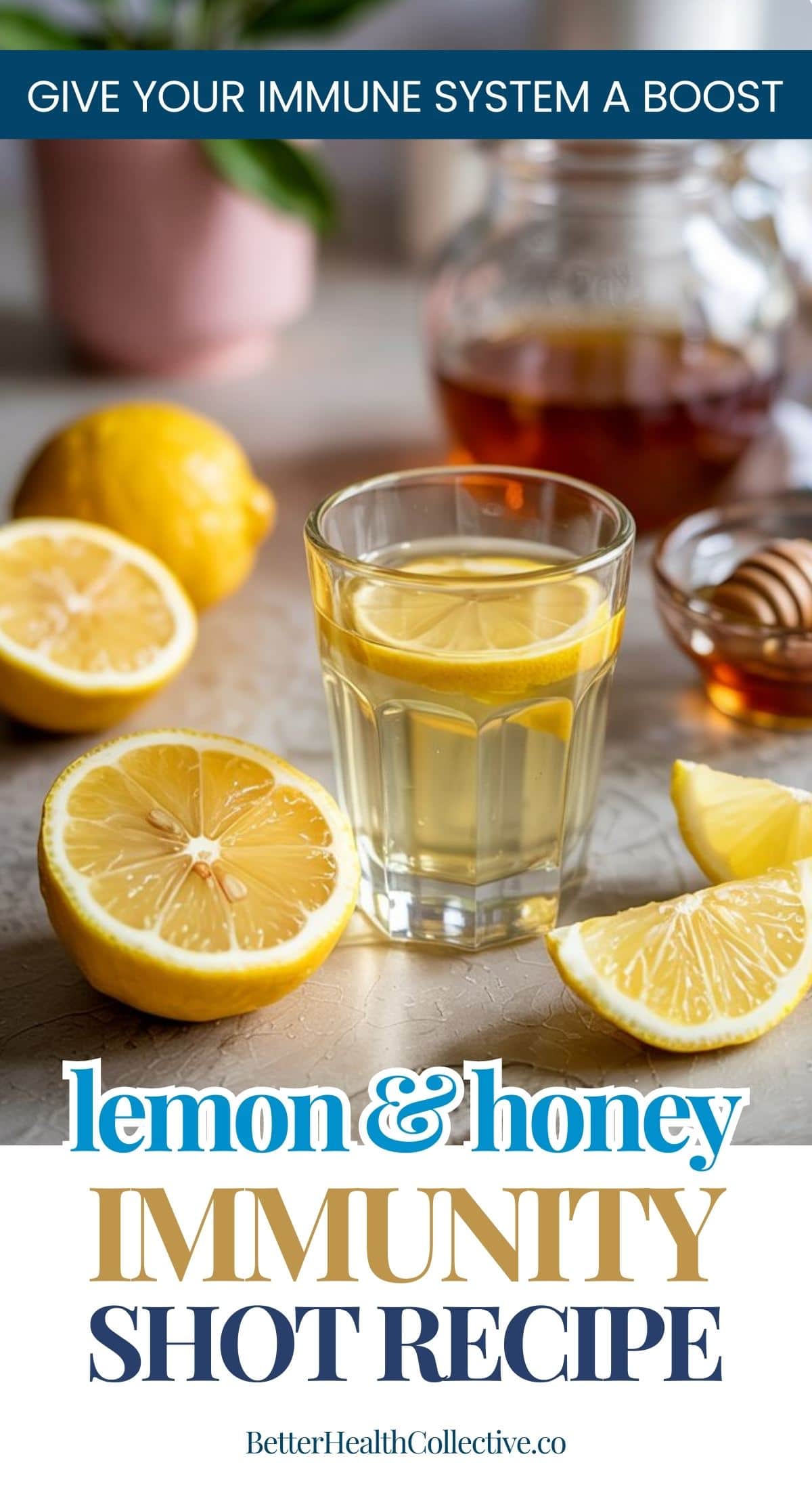 A glass of Lemon Honey Immunity Shots with lemon slices inside, surrounded by fresh lemon halves, a jar of honey, and a honey dipper; text reads lemon & honey immunity shot recipe.