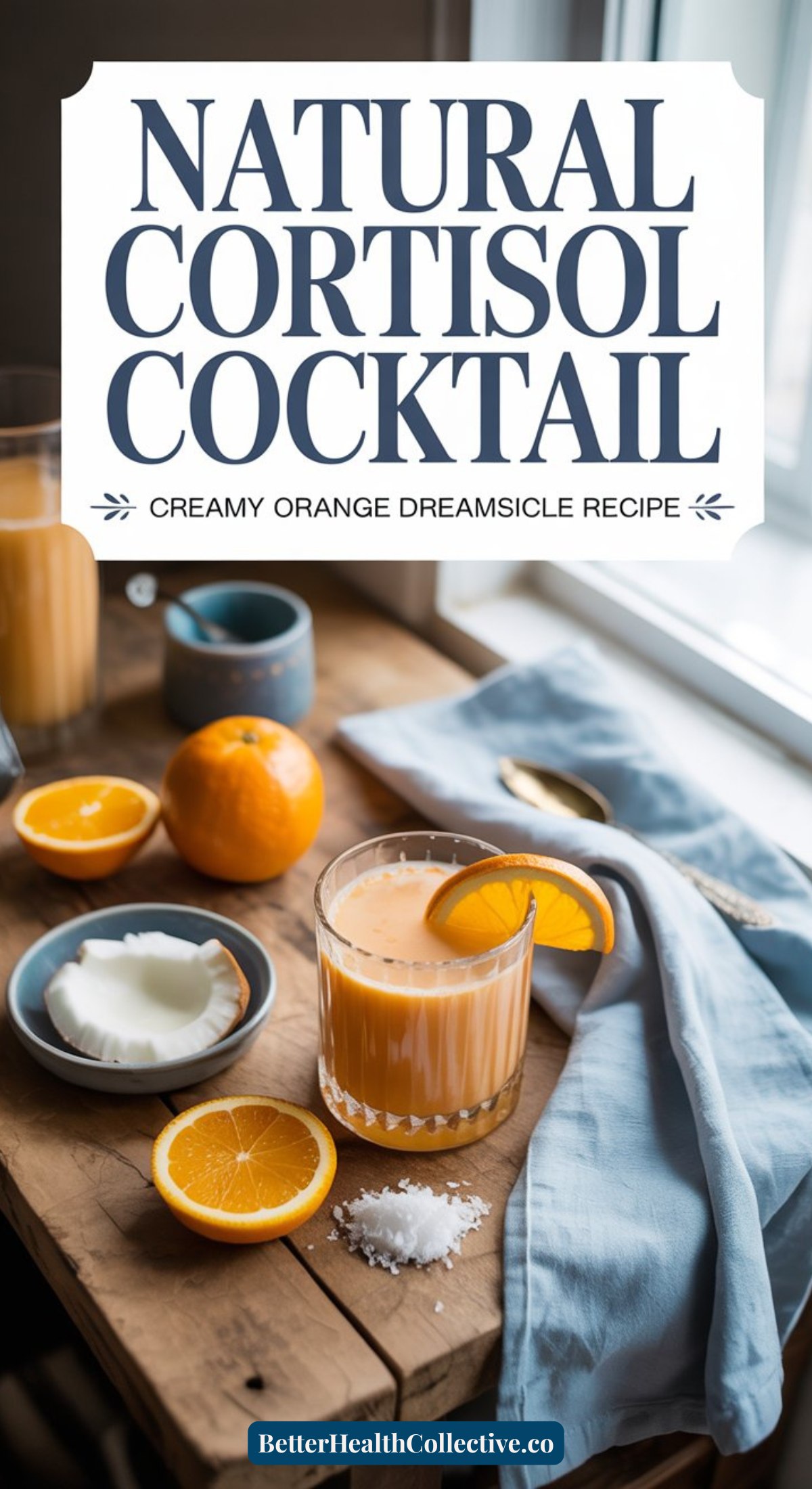 A glass of creamy orange drink garnished with an orange slice sits on a table with fresh orange halves, coconut, and a glass of juice nearby. Large text reads “Natural Cortisol Cocktail—Creamy Orange Dreamsicle Recipe.”.