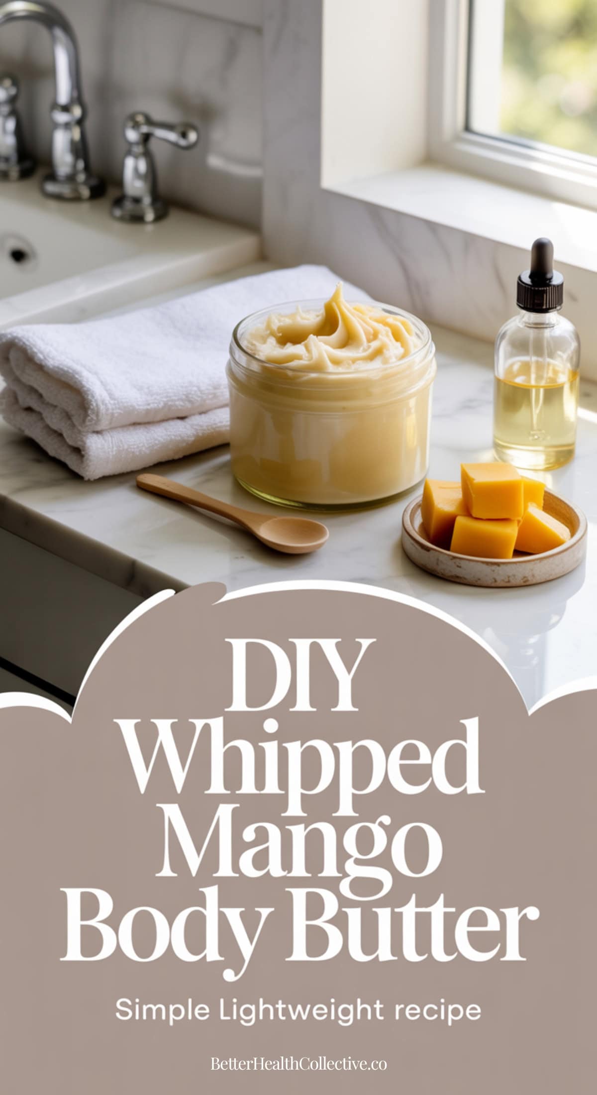 A jar of lightweight, non-greasy whipped mango body butter sits on a marble counter beside a towel, a wooden spoon, a dropper bottle, and mango cubes. Text reads: “DIY Whipped Mango Body Butter. Simple lightweight recipe.”.