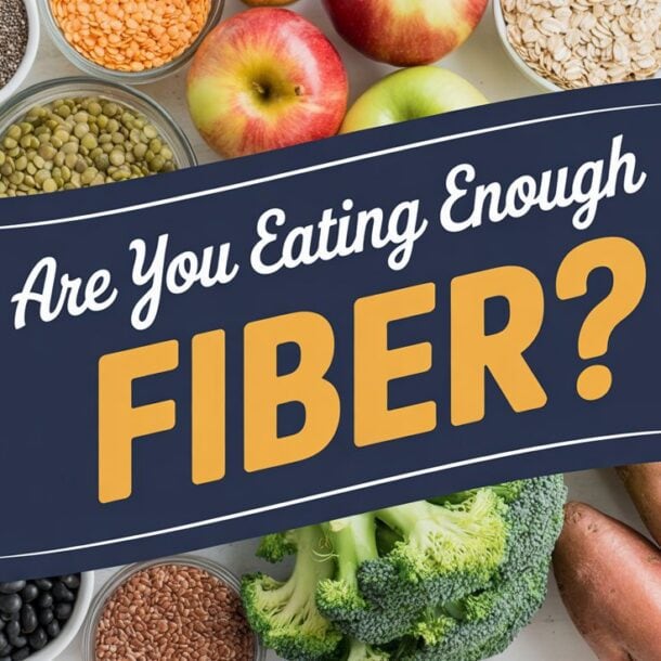 A banner reading Are You Eating Enough Fiber? over a background of fiber-rich foods, highlighting common low fiber symptoms and the importance of avoiding fiber deficiency with apples, broccoli, sweet potatoes, avocado, raspberries, almonds, oats, beans, and seeds.