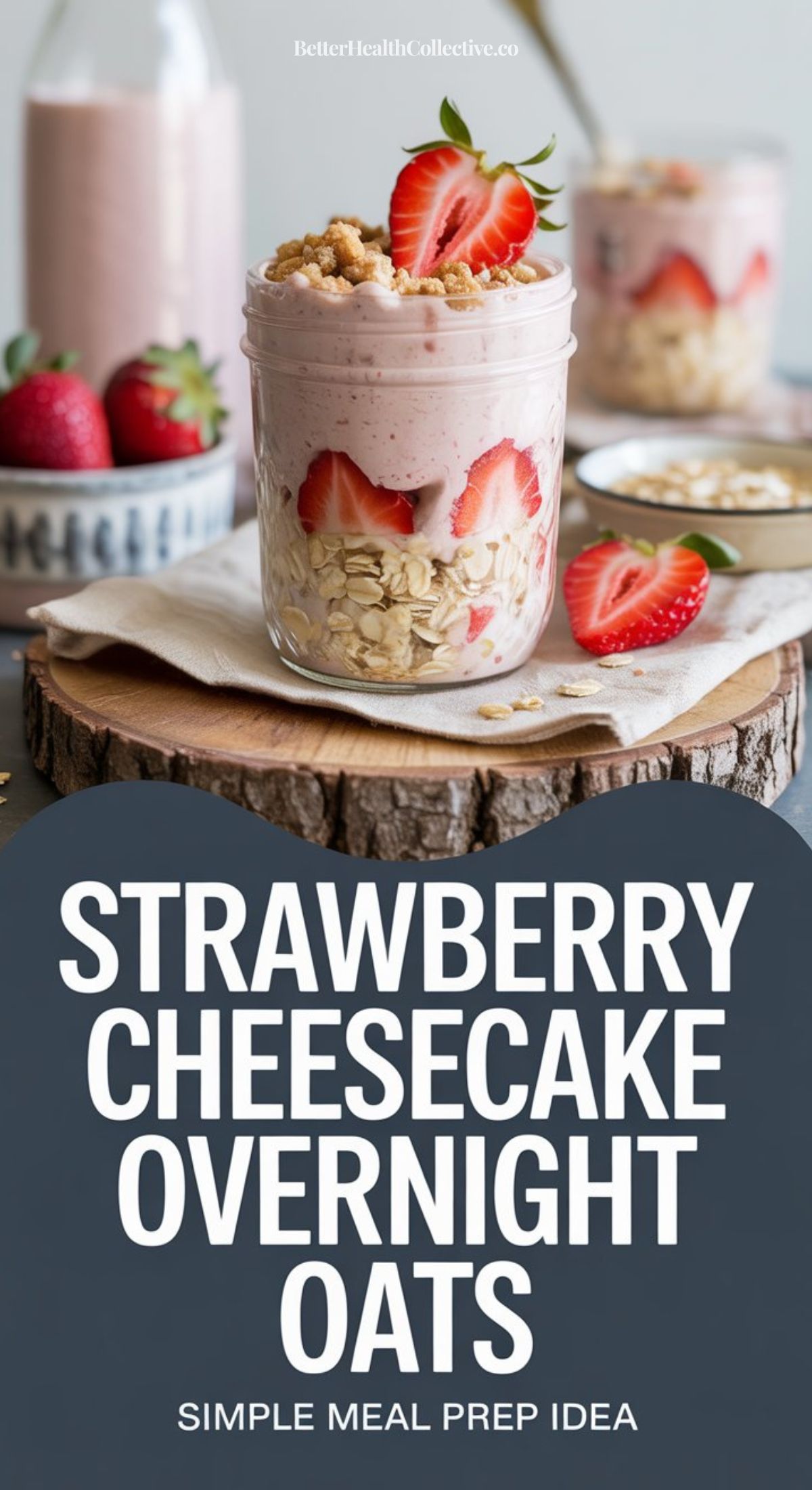 A jar of Strawberry Cheesecake Overnight Oats topped with granola and fresh strawberries sits on a wooden board. In the background, more oats, fresh berries, and a second serving complete this tempting breakfast scene. Bold text: Strawberry Cheesecake Overnight Oats.